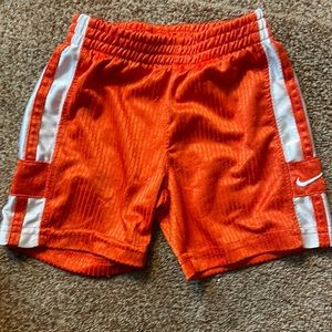 Orange and white Nike shorts 12M